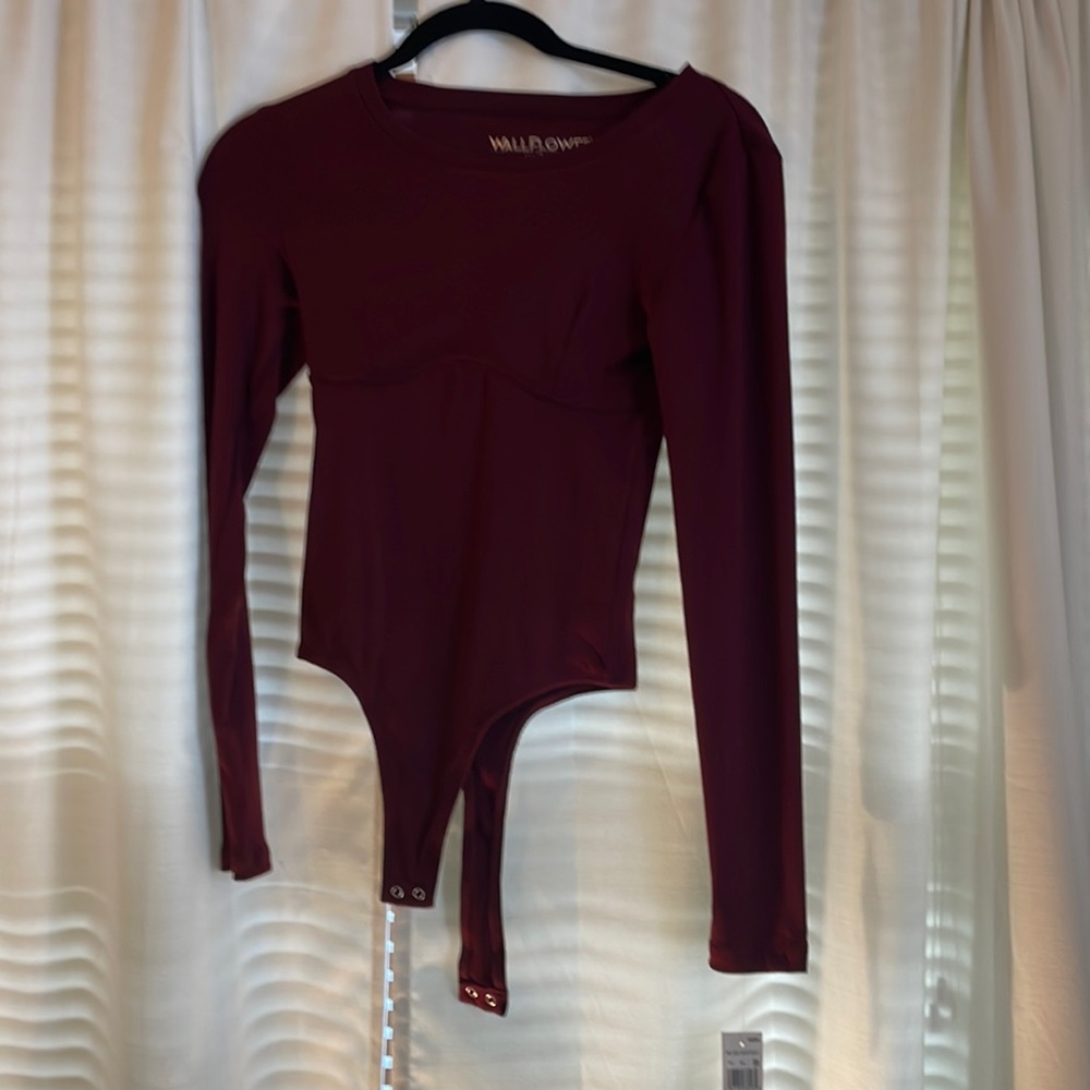 Never worn red body suit